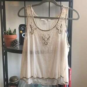 Cream, gold, sheer tank top.